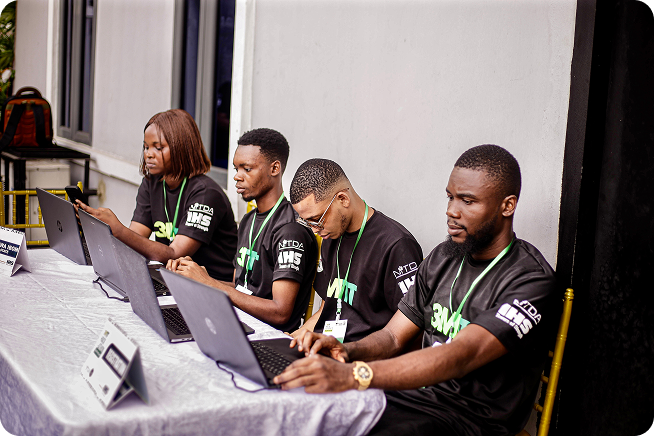 Fellows working on laptops